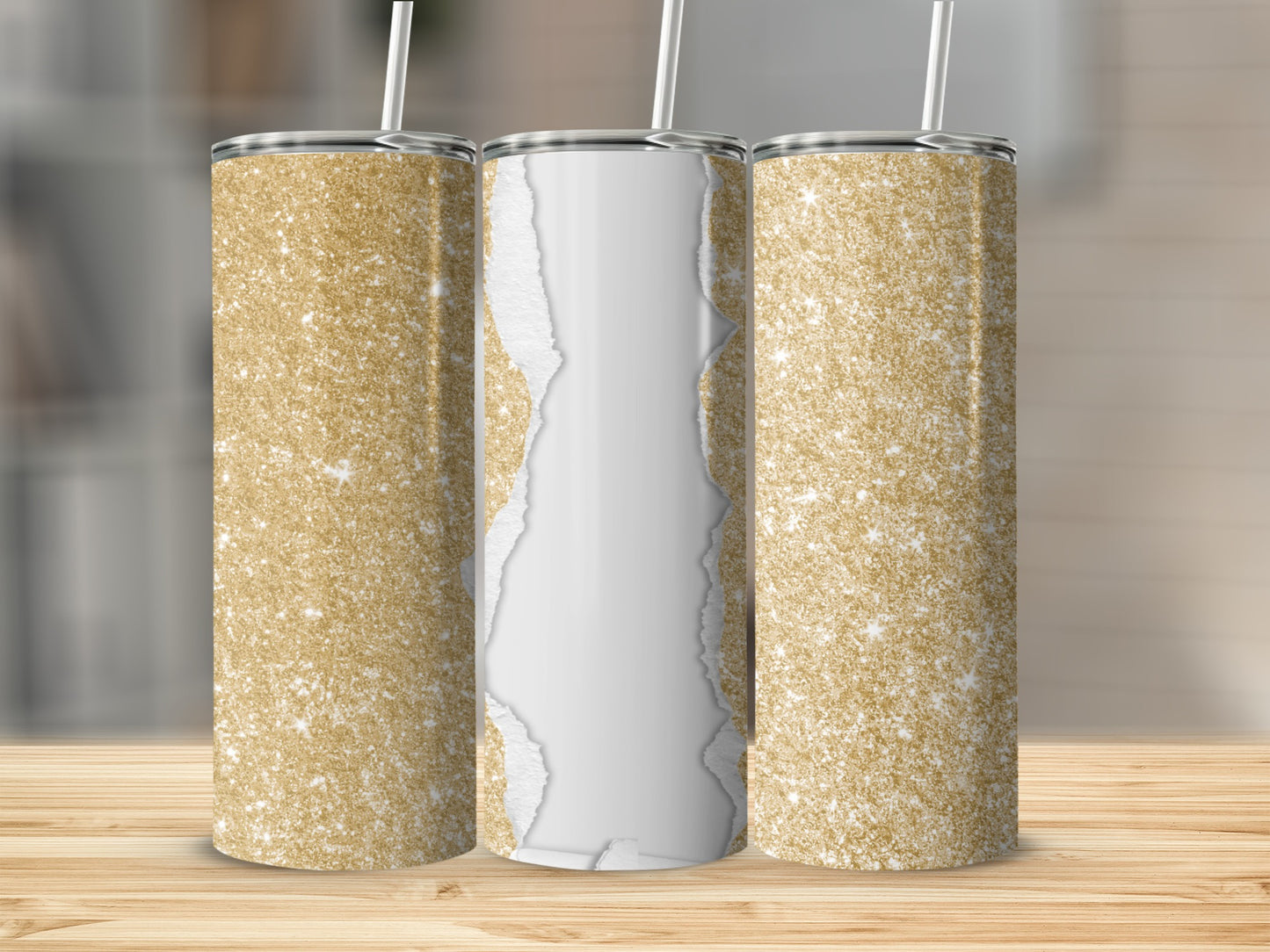 Three glitter tumblers with torn paper design on a wooden surface.