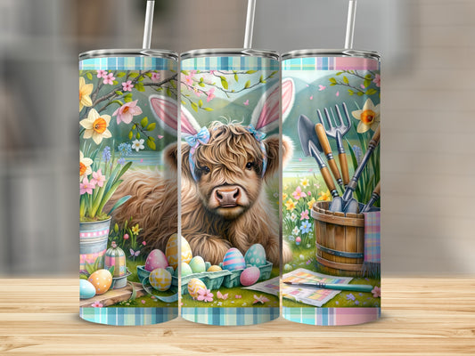 Fluffy Highland cow with bunny ears, surrounded by Easter eggs and gardening tools.