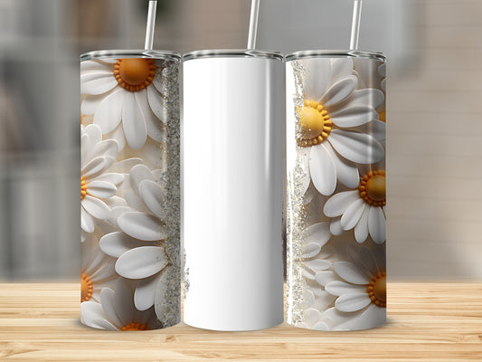 Three white tumblers with a daisy and glitter design, one blank.
