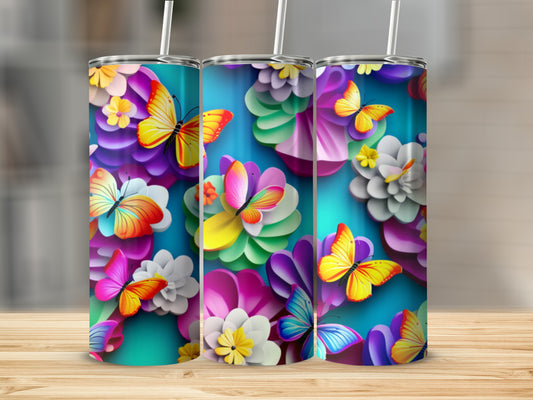 Three floral tumblers with colorful butterflies and flowers.