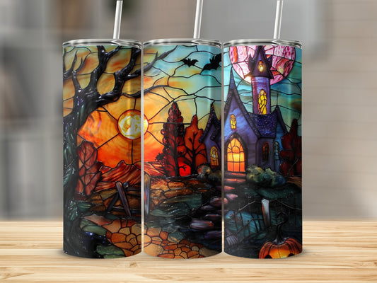 Halloween stained glass tumbler featuring a haunted house and bats.