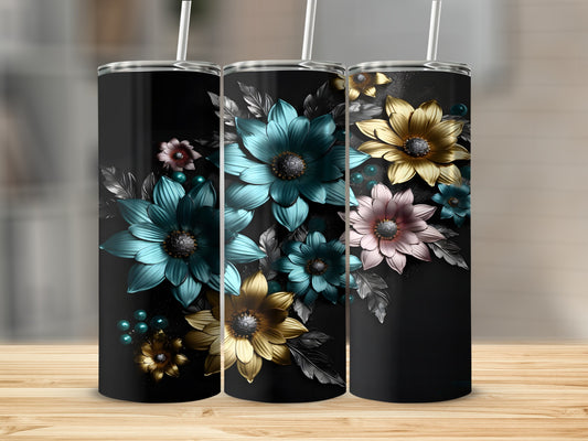 Three tall tumblers with colorful floral designs on a wooden surface.