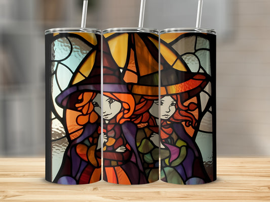 Two witches with orange hats and stained-glass background on tumblers.