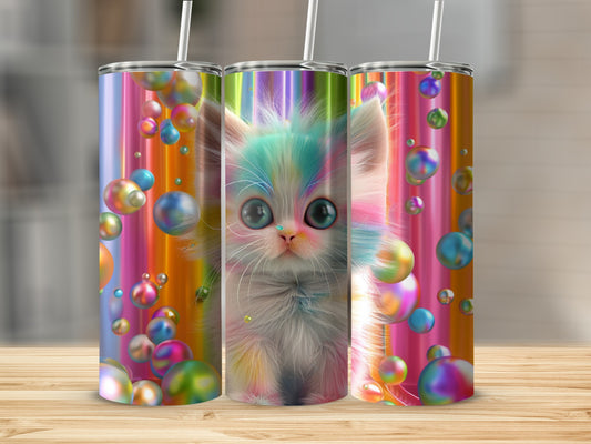 Colorful kitten with large eyes surrounded by iridescent bubbles on a tumbler.