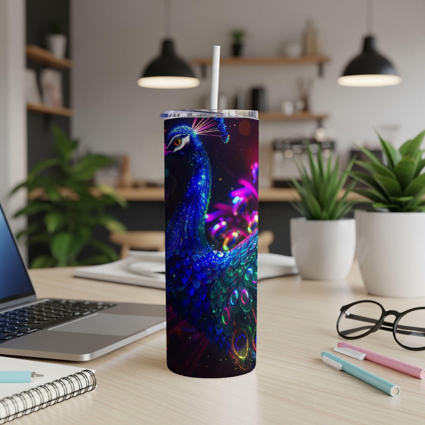 Sparkling peacock design on a tall, slim tumbler with a straw.