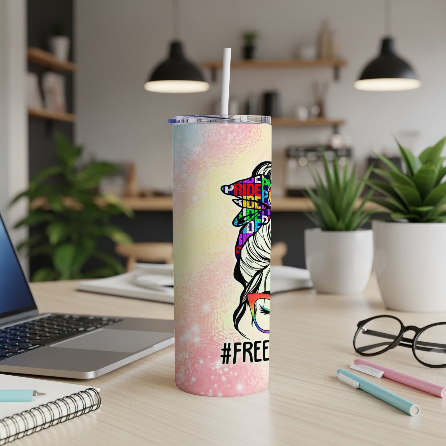 Rainbow tie-dye tumbler with messy bun, glasses, and #pride text.