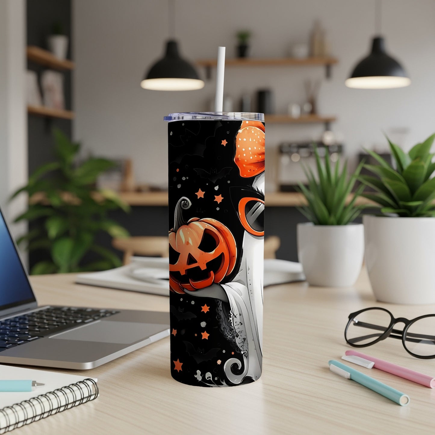 Halloween tumbler with ghost, pumpkin, bats, and stars design.