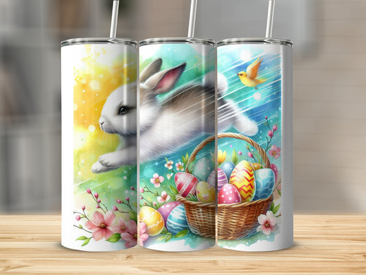 Three Easter-themed tumblers with bunnies, eggs, flowers, and a basket.