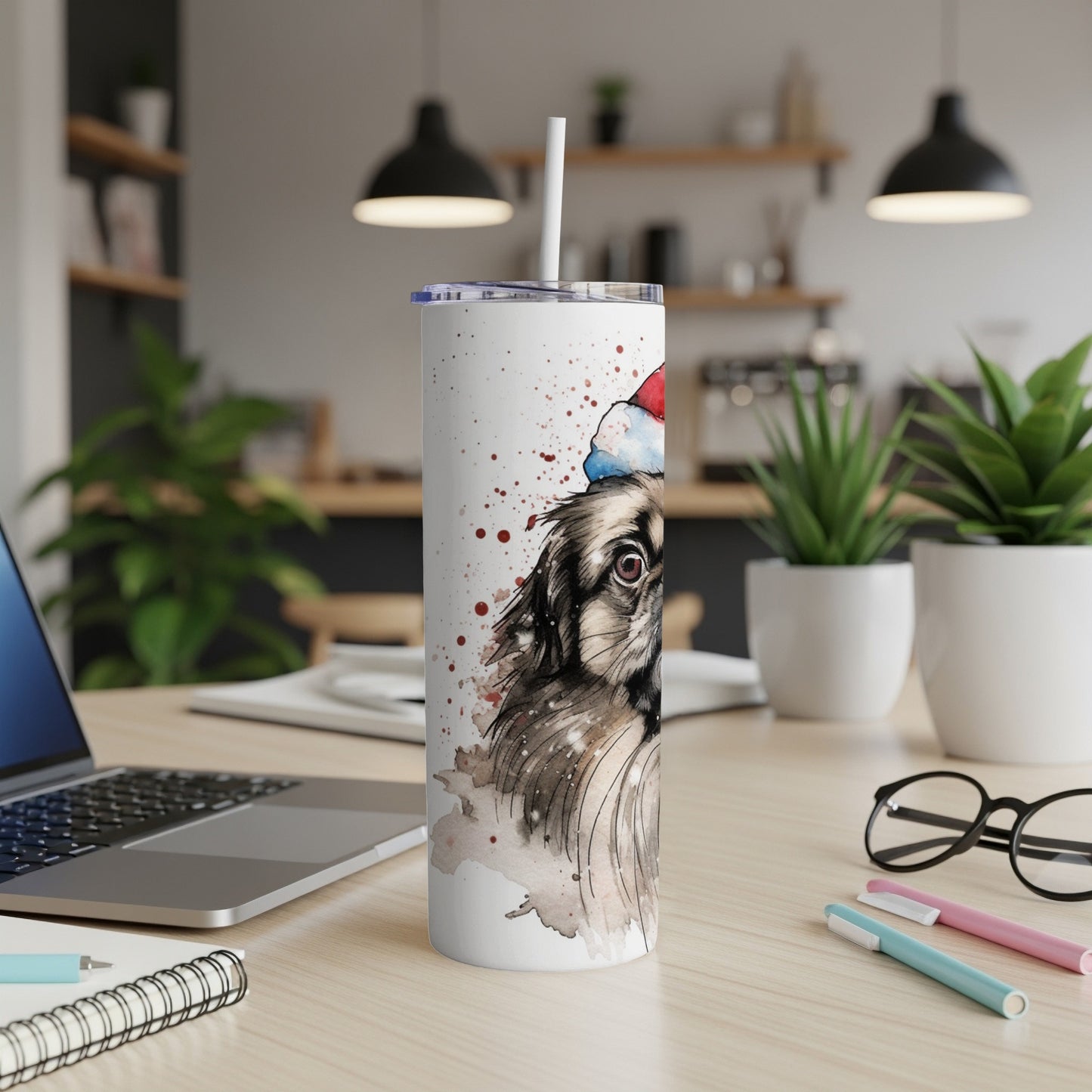 Watercolor portrait of a dog wearing a Santa hat on a white tumbler.