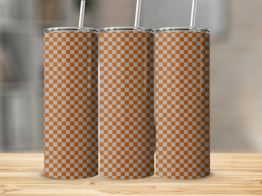 Three tall, patterned tumblers with a checkered orange and grey design.