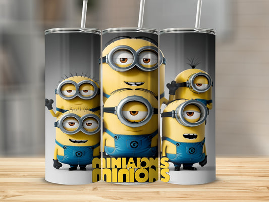 Trio of Minions characters on a tumbler with straw.