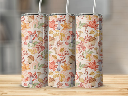 Three tumblers with autumn leaf and mushroom pattern.