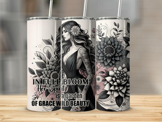 Tumbler with floral design and text "In Full Bloom Is A Garden Of Grace Wild Beauty".
