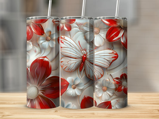 Three tumblers featuring white butterflies and red and white flowers.
