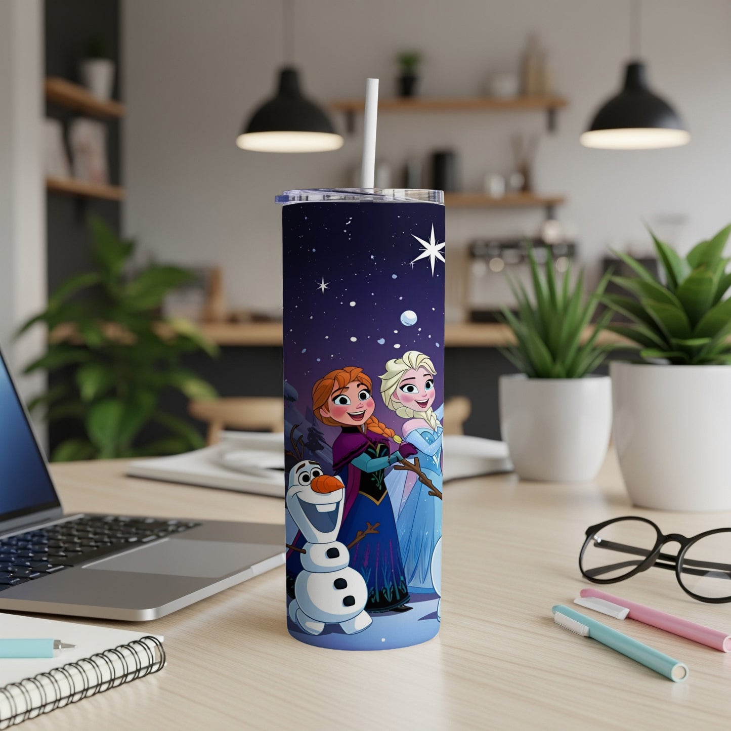 Elsa and Anna with Olaf against a starry night sky on a tumbler.