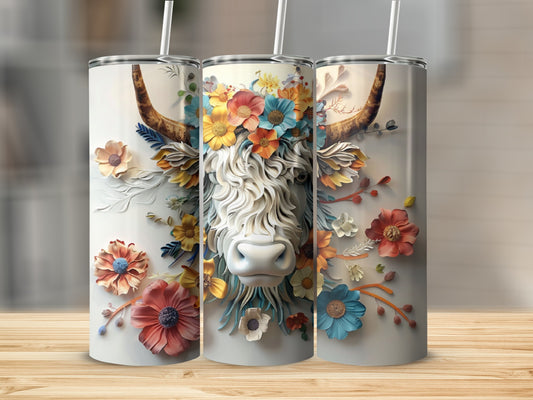 White cow with floral accents on a white tumbler cup.