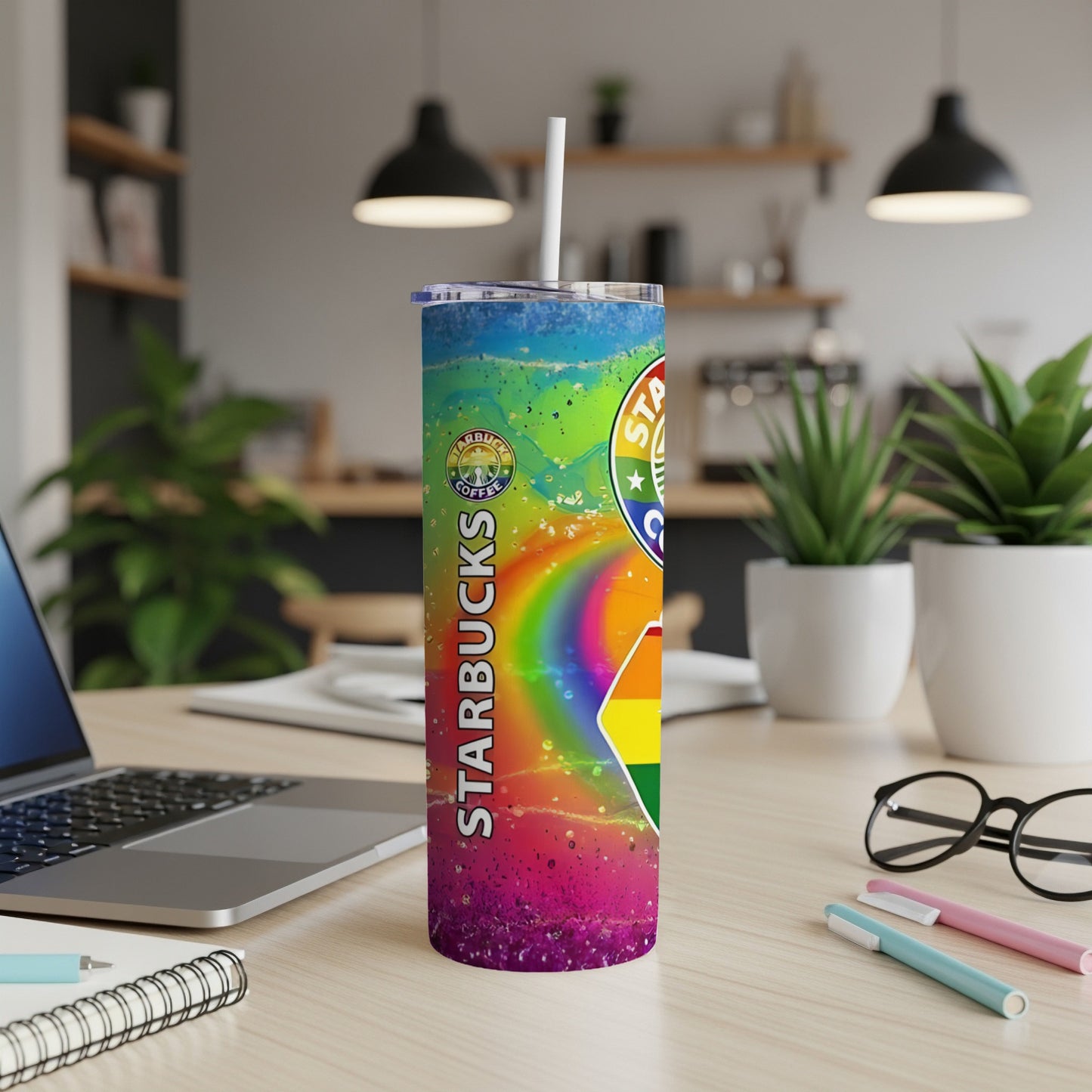 Starbucks coffee tumbler with rainbow and glitter design, white straw.