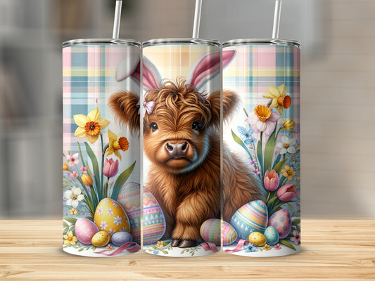 Highland cow with bunny ears and Easter eggs, surrounded by flowers.