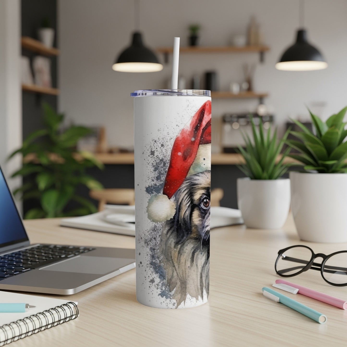 Watercolor painting of a dog wearing a Santa hat on a tumbler cup.
