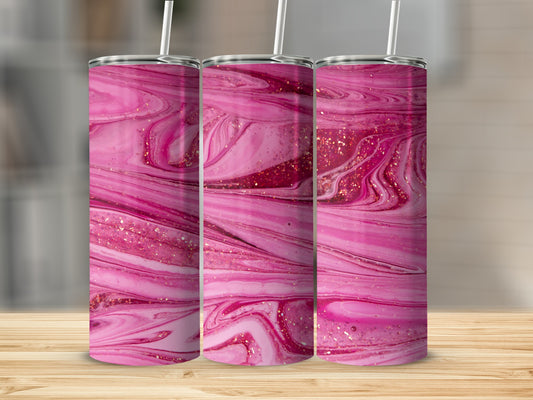 Three pink marble design tumblers with glitter on a wooden surface.