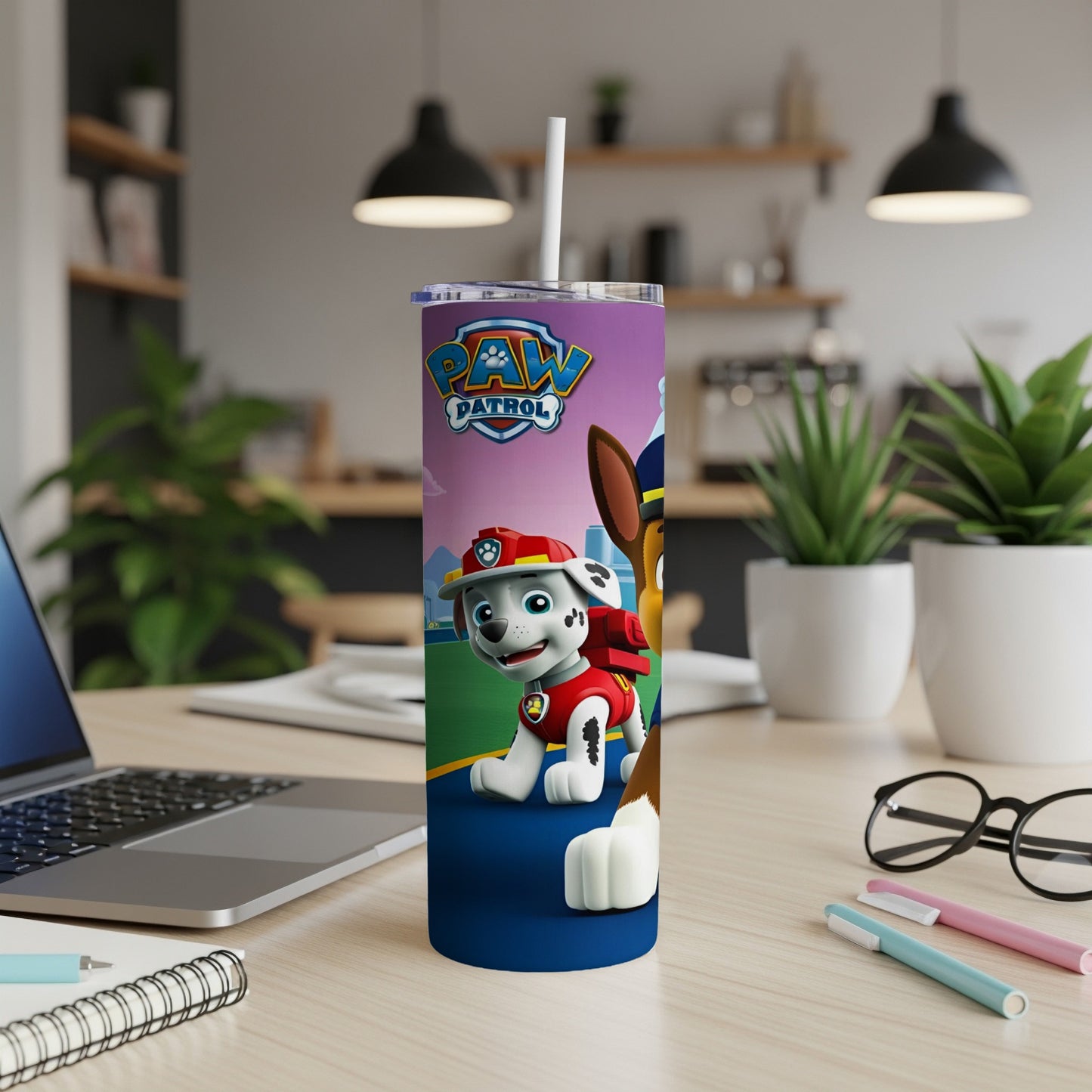Paw Patrol Marshall character on a purple and blue insulated tumbler.
