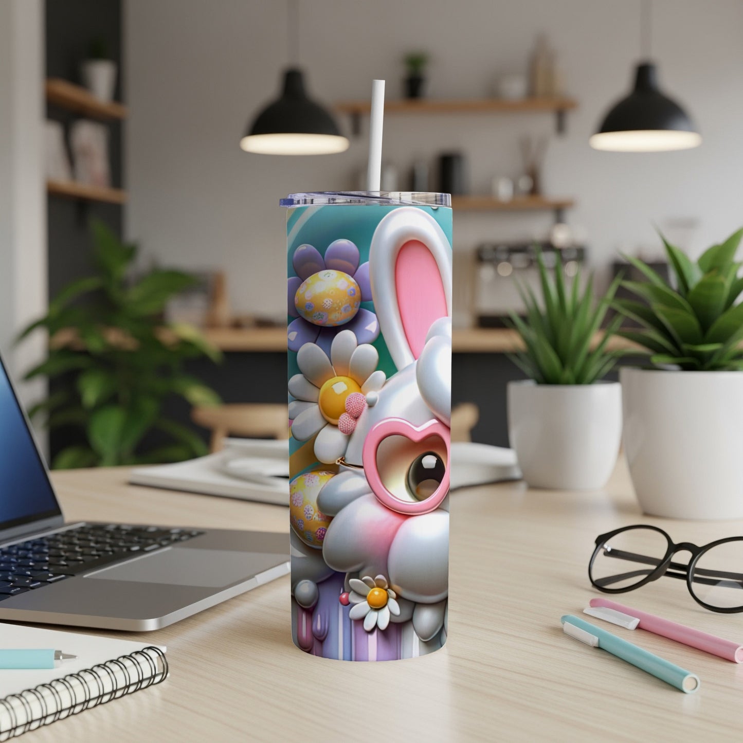 Easter bunny tumbler with heart sunglasses on a desk.