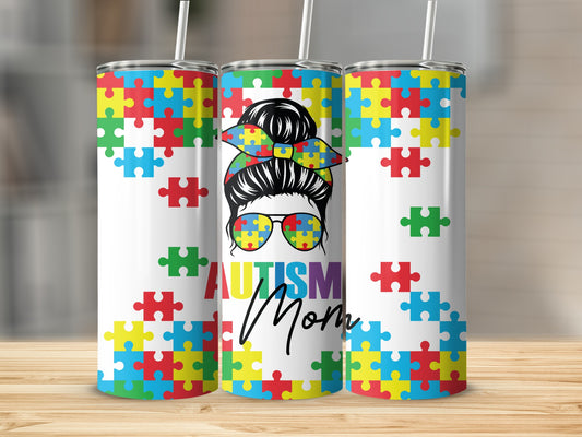 Autism Mom tumbler with puzzle piece design and sunglasses.