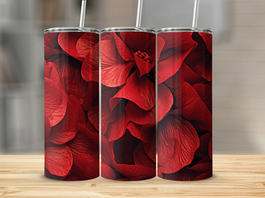 Three tall tumblers with a repeating pattern of red flower petals.