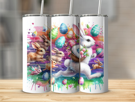 Three tumblers with watercolor Easter bunnies and colorful eggs.