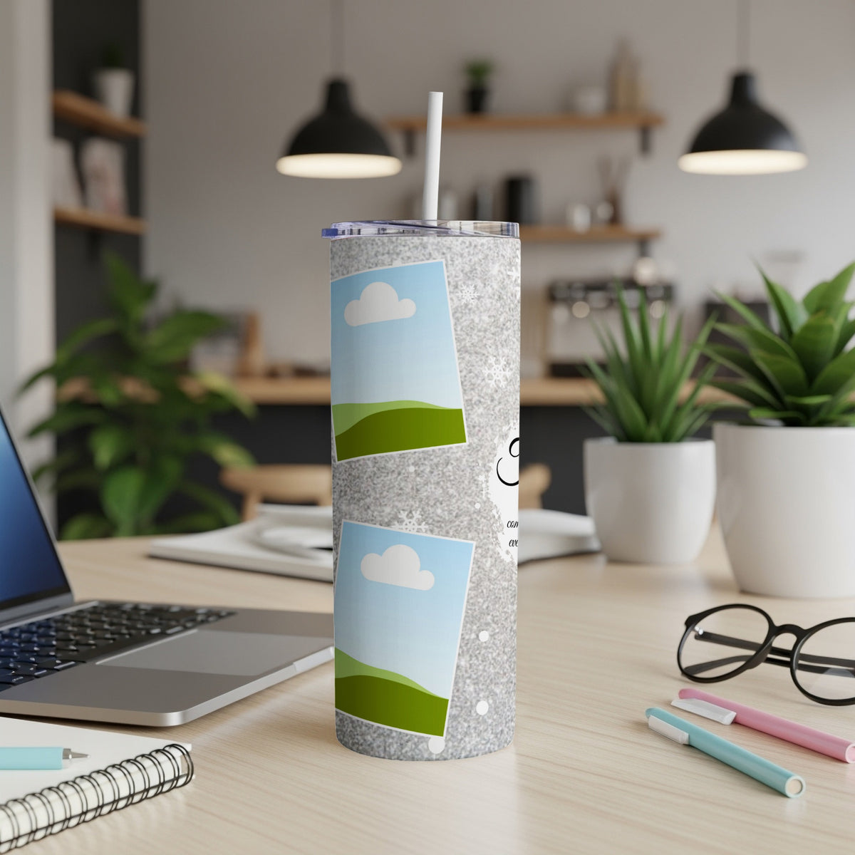 Silver glitter tumbler with two photo frames and snowflakes.
