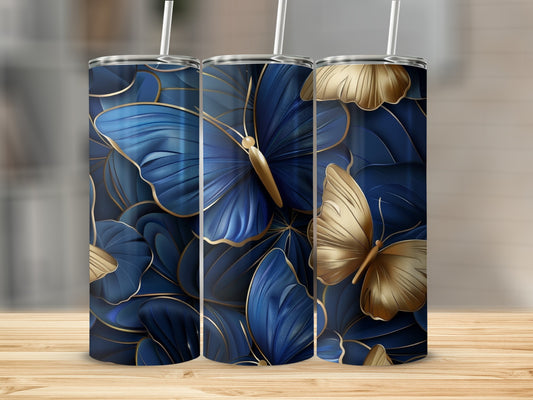 Three tumblers with navy blue butterflies and gold accents.