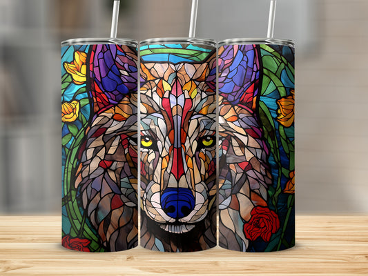 Stained glass wolf tumbler with colorful floral accents and straws.