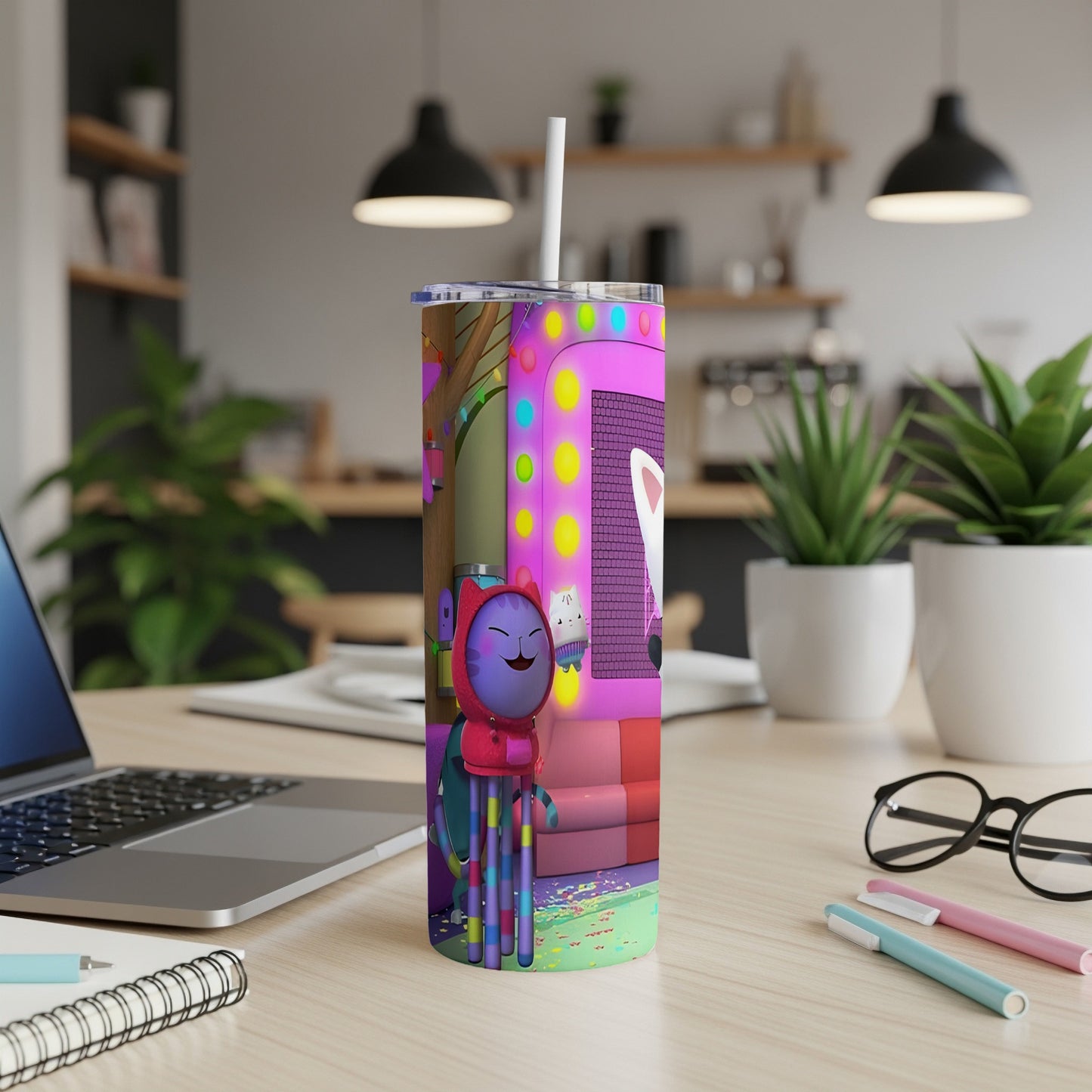 Pink and purple tumbler with cartoon character and playful lights.