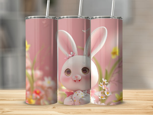 Three pink tumblers featuring a cute cartoon bunny holding an Easter egg.