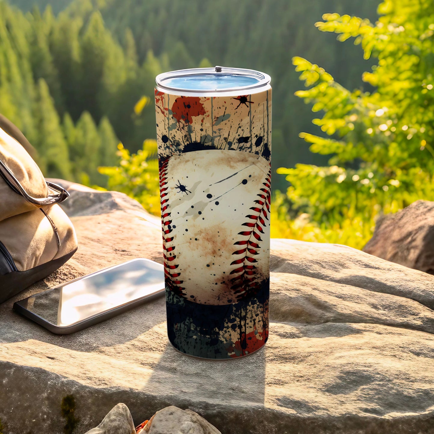 Baseball tumbler with splash art and rocky outdoor background.