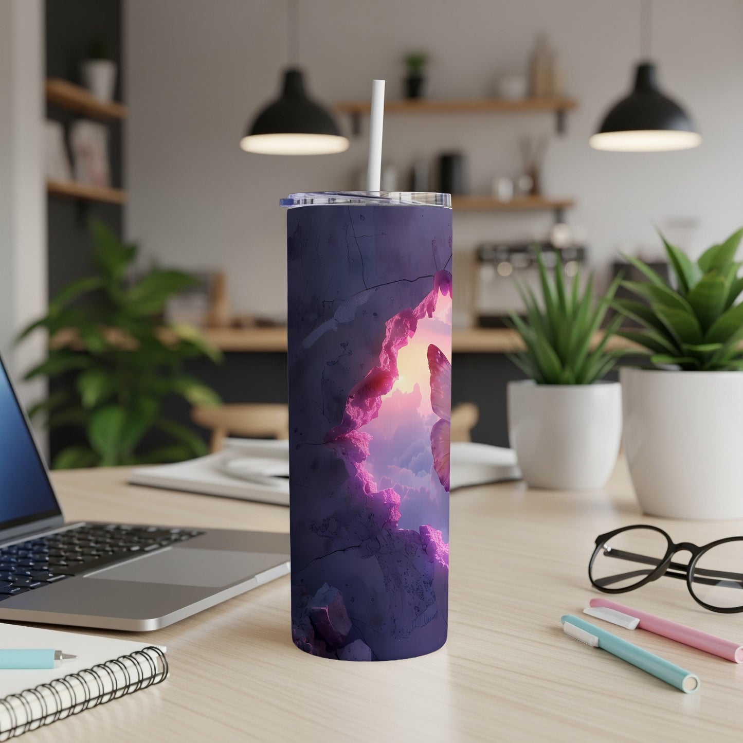 Purple tumbler with crack revealing butterfly and pink clouds.