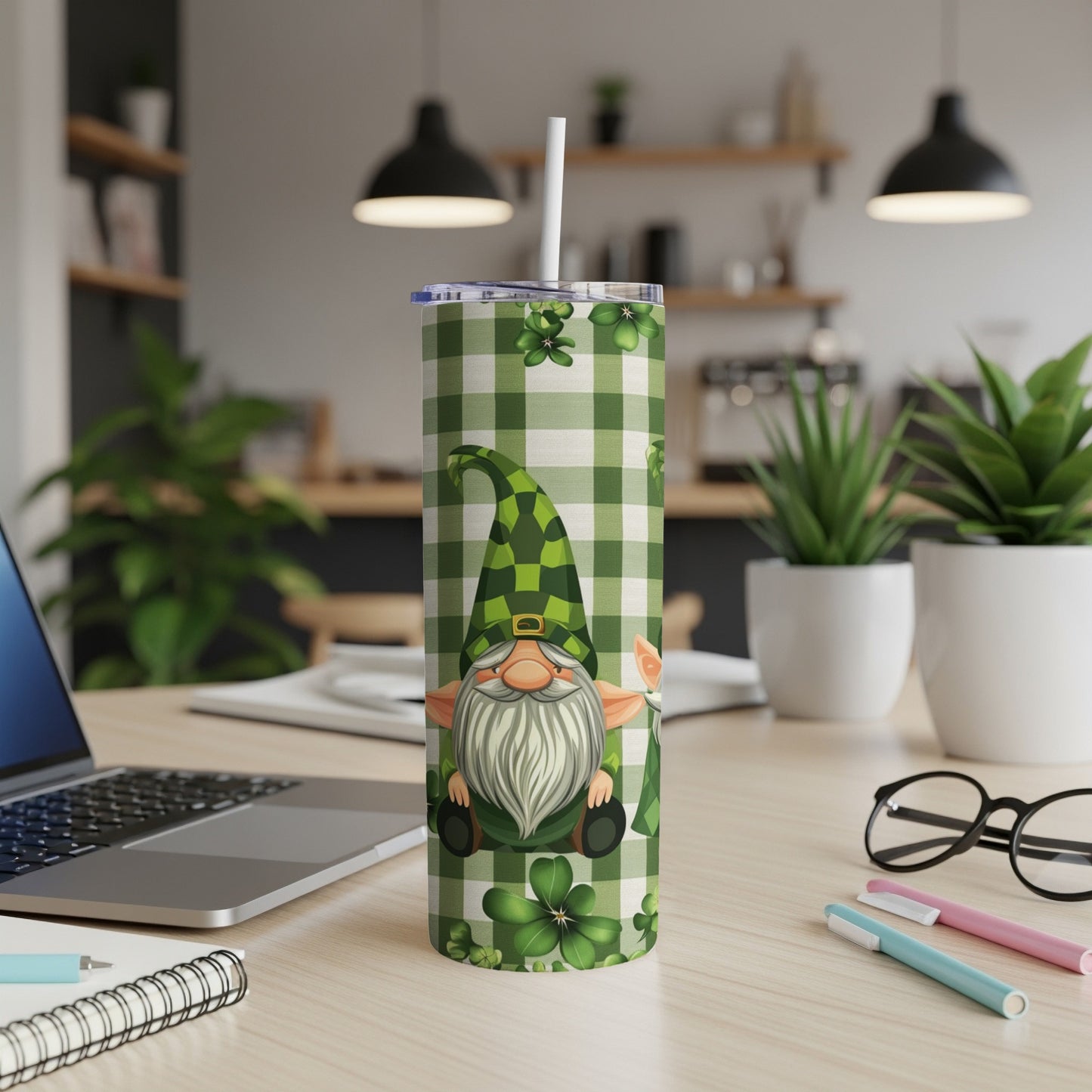 Green plaid tumbler with gnome design and shamrocks.