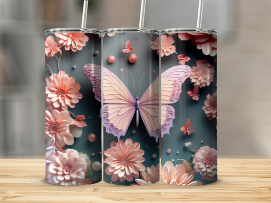 Three pink floral tumblers with butterflies, displayed on a wooden surface.