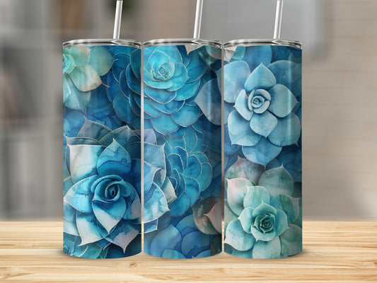 Three blue succulent tumblers with straws on a wooden surface.