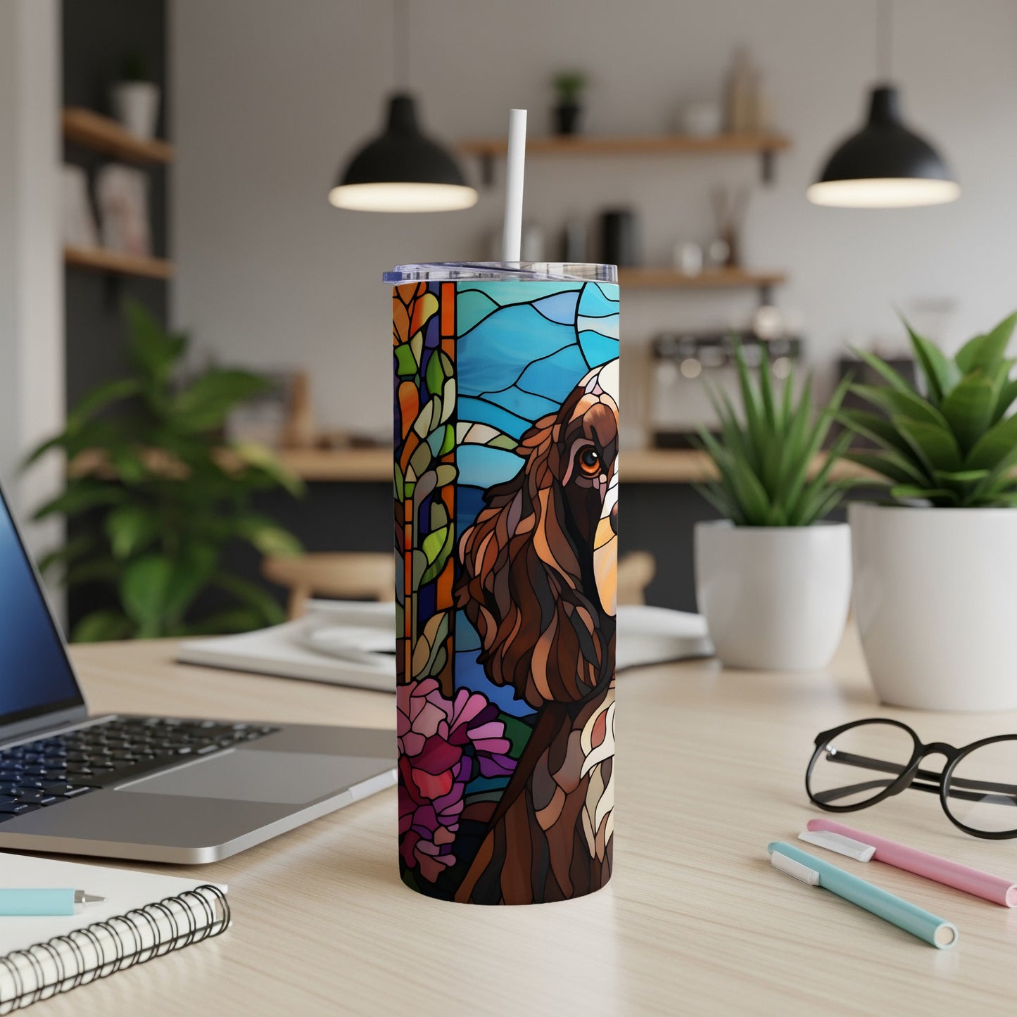Stained glass dog and floral design on a tumbler.