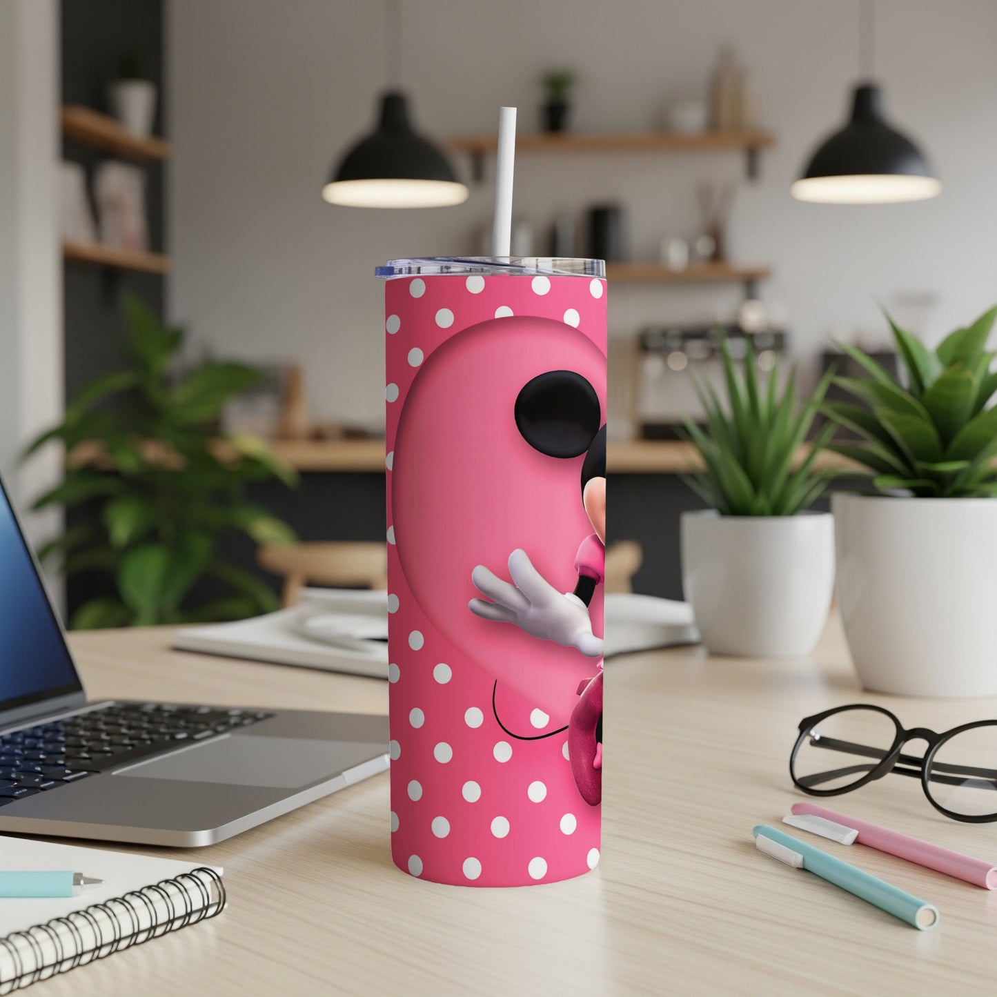 Minnie Mouse on a pink polka dot tumbler with straw.