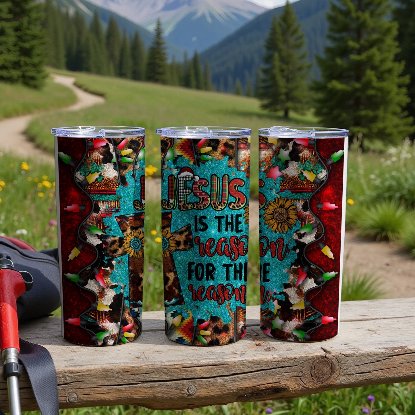 Three tumblers with "Jesus is the reason for the season" text and festive, country-themed designs.