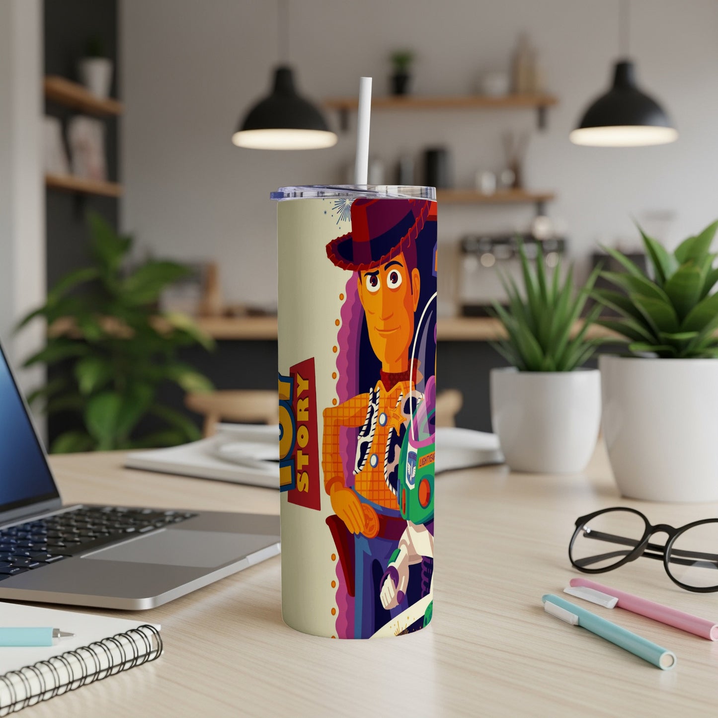 Toy Story Woody design on a tall tumbler with a straw.