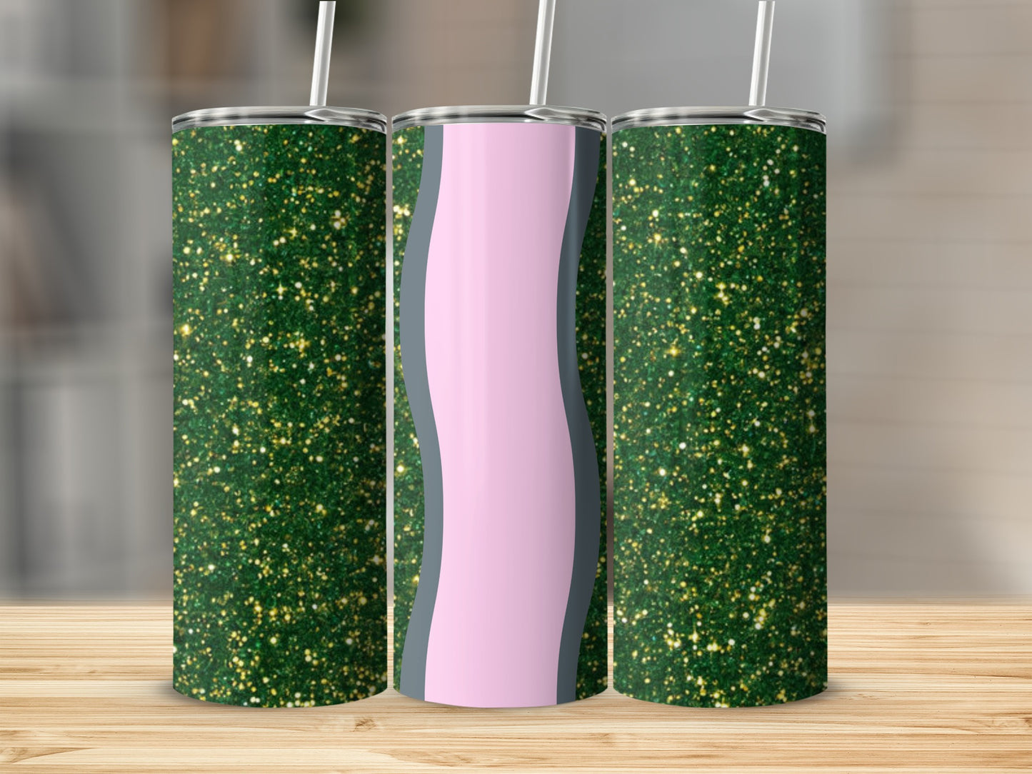 Three green glitter tumblers with a pink wave design.