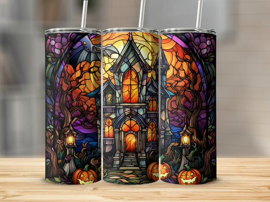Three stained glass tumblers with a haunted house and pumpkins Halloween design.