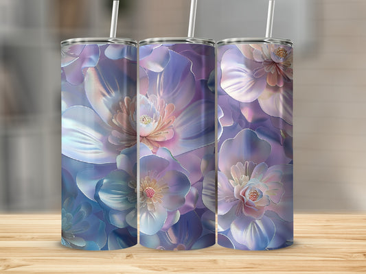 Three tumblers with iridescent floral patterns, standing on a wooden surface.