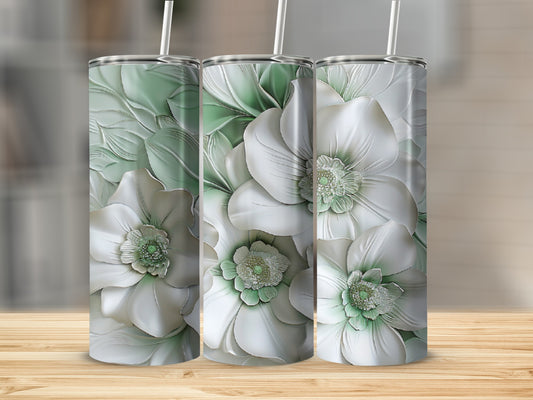 Three tumblers with a detailed white floral design and green accents.