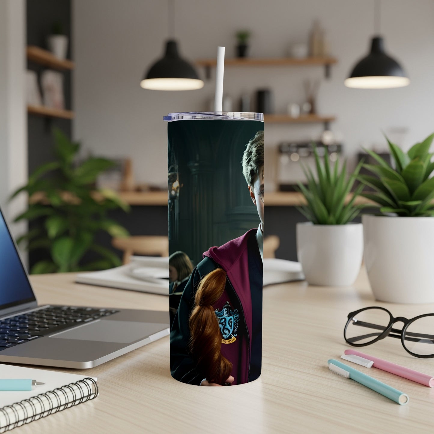 Harry Potter character illustration on a dark blue skinny tumbler with white straw.