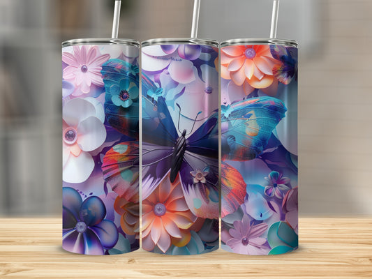 Three tumblers featuring a butterfly and floral designs on a wooden surface.