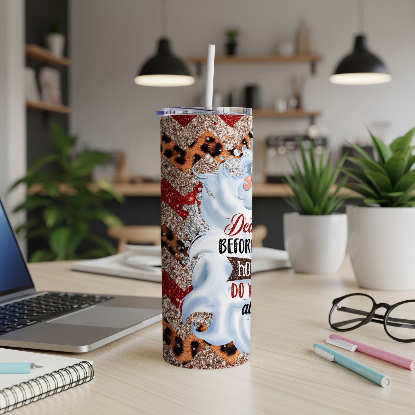 Santa Claus tumbler with leopard print, glitter, and festive red and white stripes.
